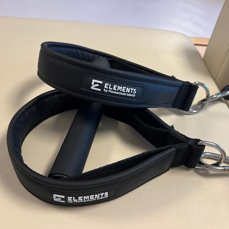 ELEMENTS® Compact Loop and Roll in black colour on a Pilates Reformer