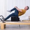 ELEMENTS_Sean_Bergara_Collection_010 Pilates instructor Sean Bergara training with ELEMENTS Safety Foot Strap on Reformer