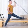 ELEMENTS Sean Bergara Collection ELEMENTS Sean Bergara Collection roll handles in use on a reformer
