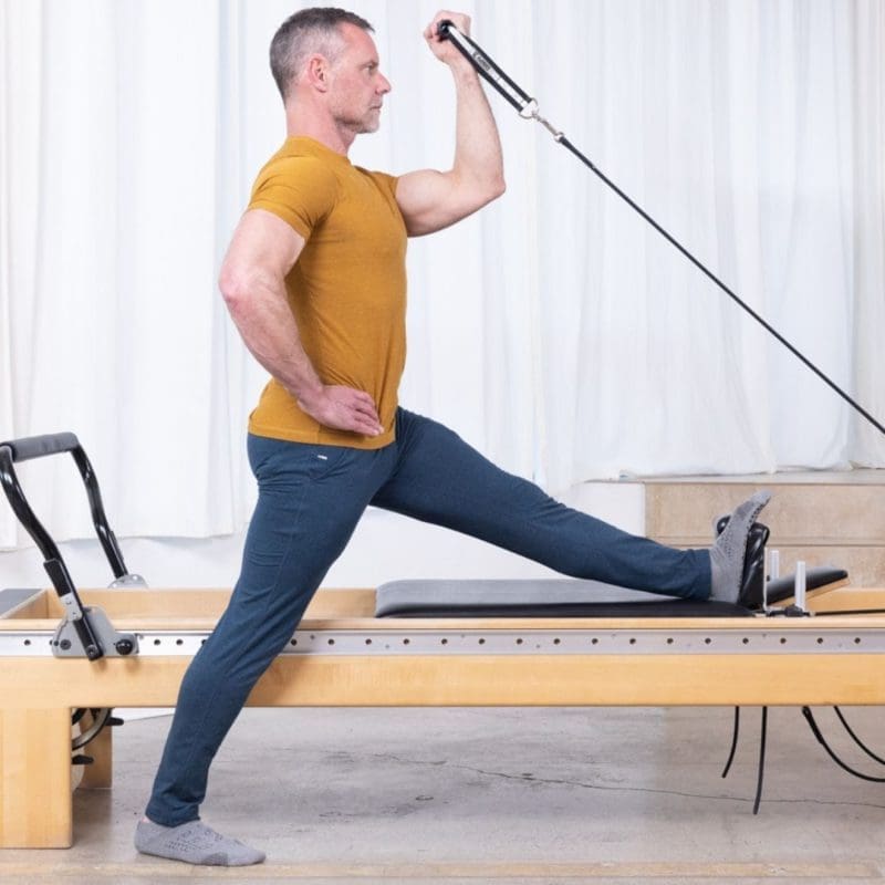 ELEMENTS Sean Bergara Collection roll handles in use on a reformer