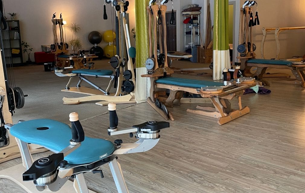 Elaine's GYROTONIC® Studio with blue covers for Gyrotonic Towers