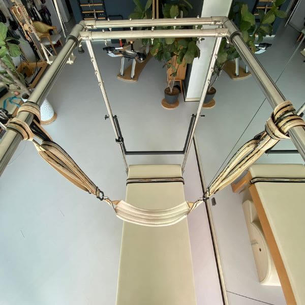 Level Loops and Wide Sling on a Pilates Cadillac Pair of Level Loops used with Wide Sling on Pilates Cadillac