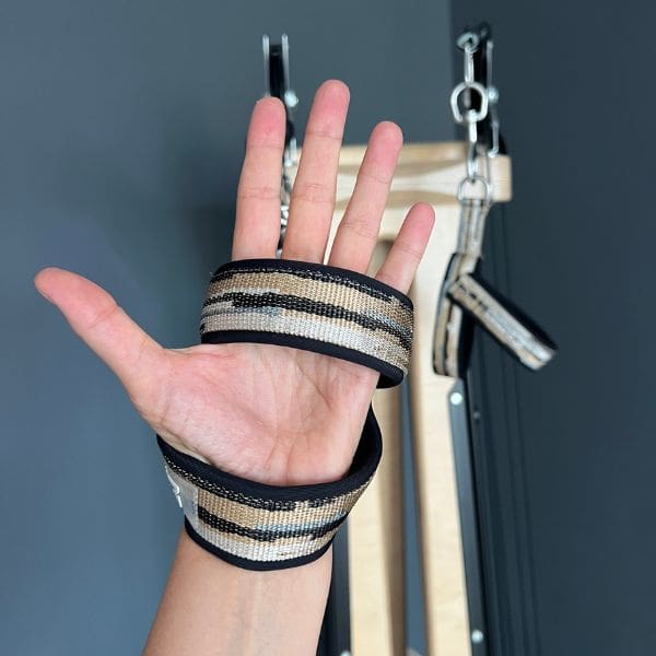 small y narrow straps in use on gyrotonic tower